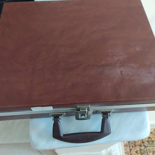Leather cassette case used for 36 tapes with velvet interior