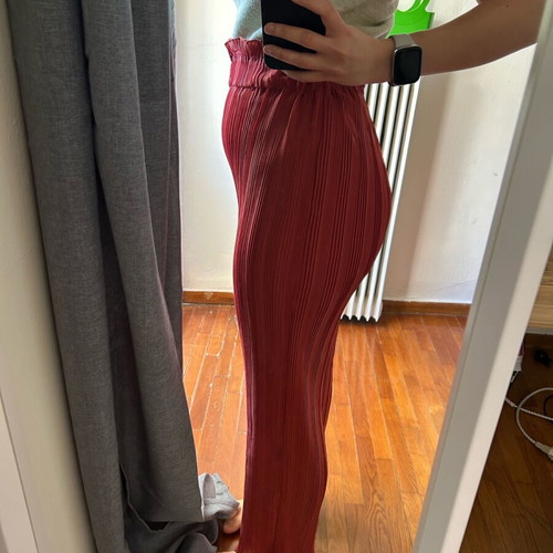 Red pants size M like new made of white fabric