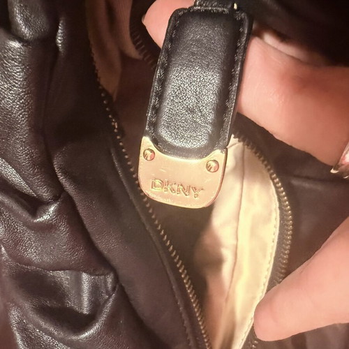 DKNY leather shoulder bag used, black with gold details