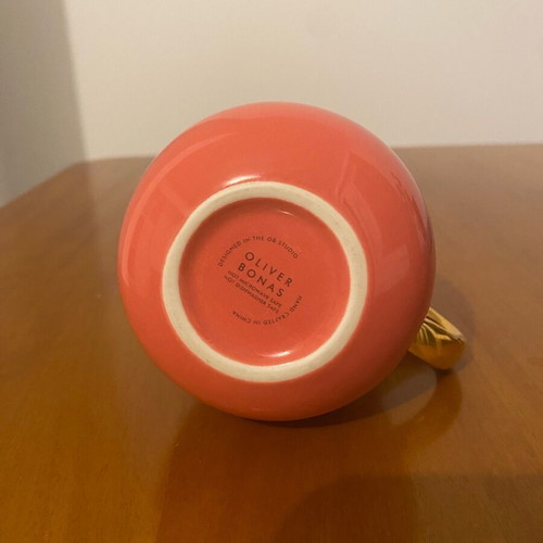 Porcelain mug pink with gold handle like new