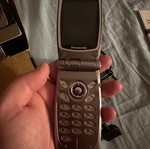 Panasonic EB-GD87 mobile phone used with box and charger needing repair