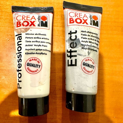 Acrylic paint and silver effect paste used for painting