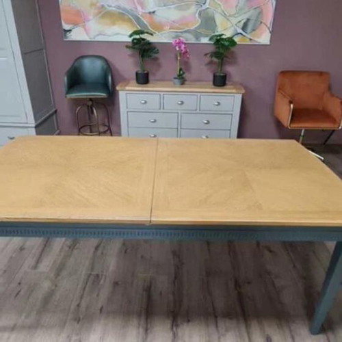 Wooden dining table new with gray legs