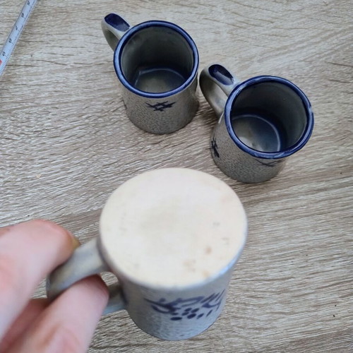 Set of 3 small stoneware cups with saltglaze