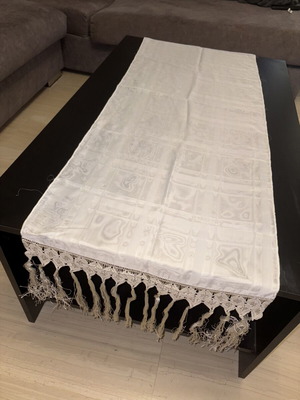 White table runner with woven design and handmade lace fringe, new