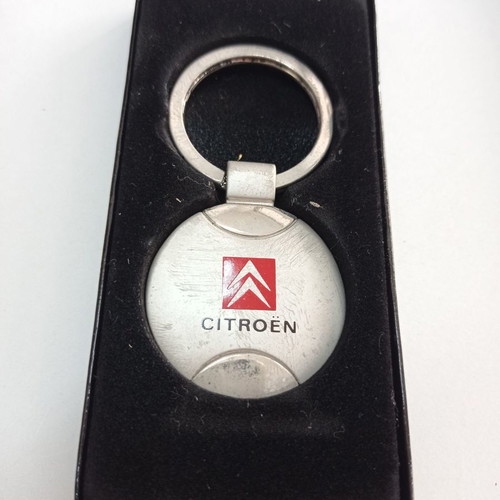 Citroen metal keychain silver with case in fair condition