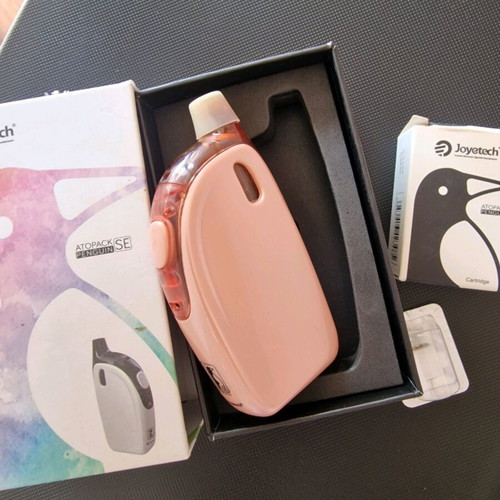 Vape Joyetech Penguin kit used with extra cartridge and coil