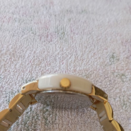 Pacoloren women's watch like new with white ceramic bracelet and gold details