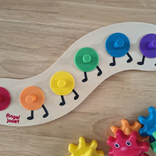 Baby toy with gears like new, wooden base and plastic gears