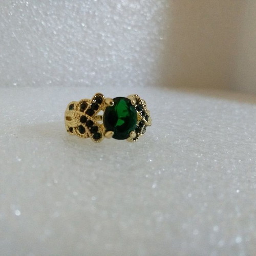 Ring with Oval Green Stone in Gold Color like new