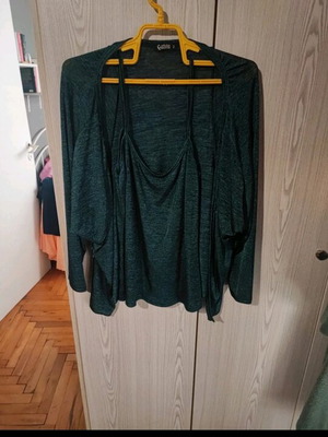 Garantie top with outerwear in petrol color like new, size L