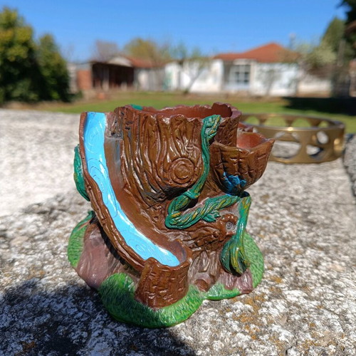 Clay cup holder/plant pot used, designed like a plane tree