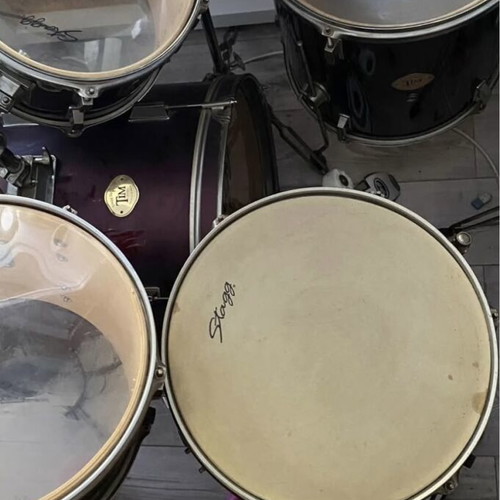 Stagg drum set used, complete with bass drum, toms, snare and cymbals