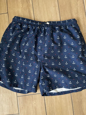 Men's swim shorts with patterns, lightly used, size L, white and blue