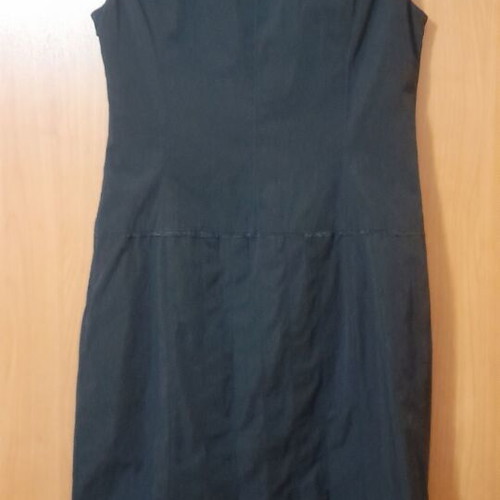 VS black sleeveless dress with round neckline and pleats, size 50