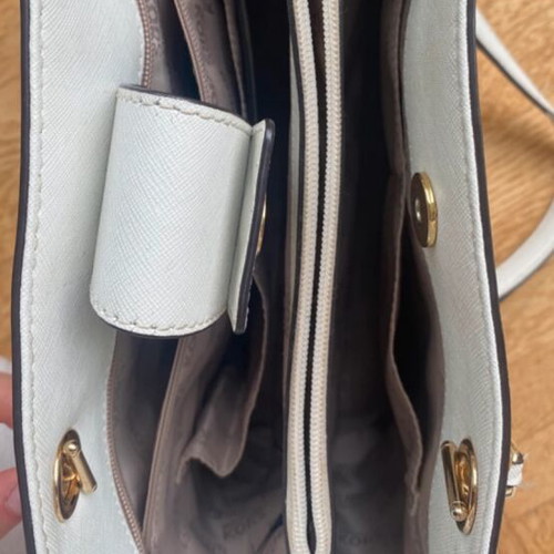 Michael Kors white tote bag with floral and dragonfly details