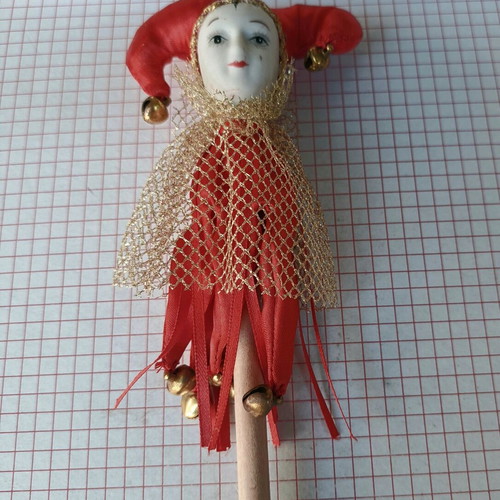 Decorative Harlequin figure on stick like new, red costume