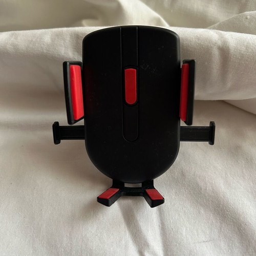 Car phone holder like new, air vent mount