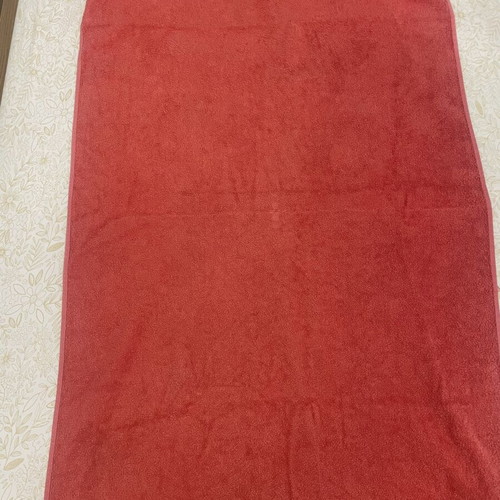 Beach towel used, coral color