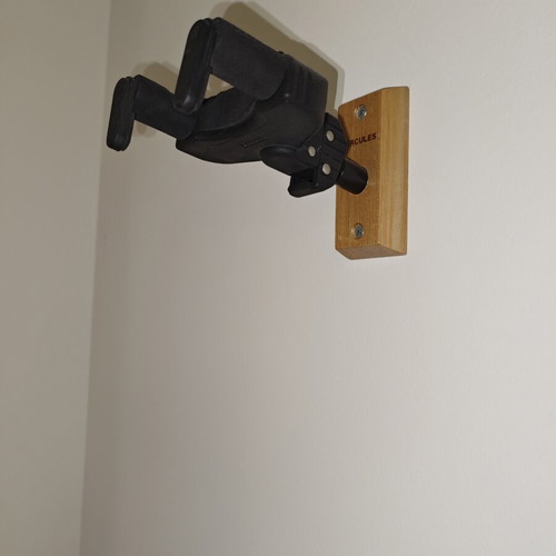 Hercules wall mount guitar and bass stand used