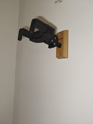 Hercules wall mount guitar and bass stand used