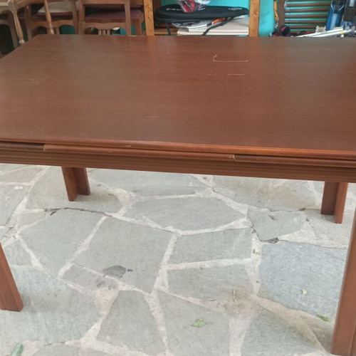 Wooden dining table used with extension
