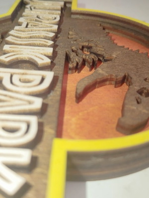 Wooden Jurassic Park decorative piece