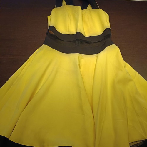 Cocktail dress with transparency at the waist like new, size M