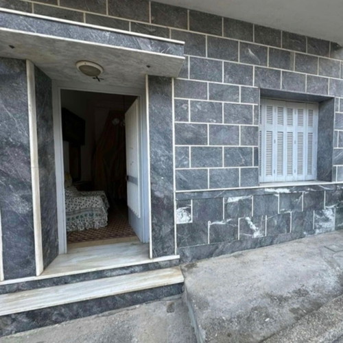 Ground floor apartment 88 sqm with yard and storage in Agia Sofia Piraeus