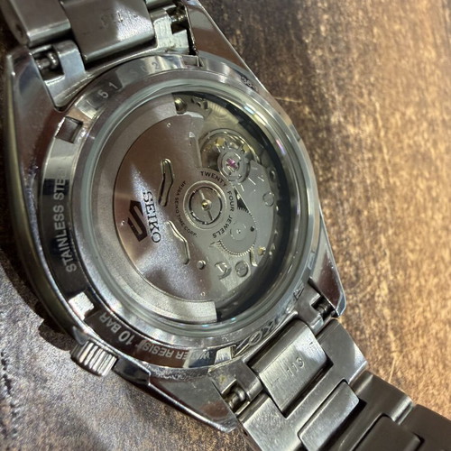 Seiko 5 Sports SNXS Series Automatic watch with silver stainless steel bracelet