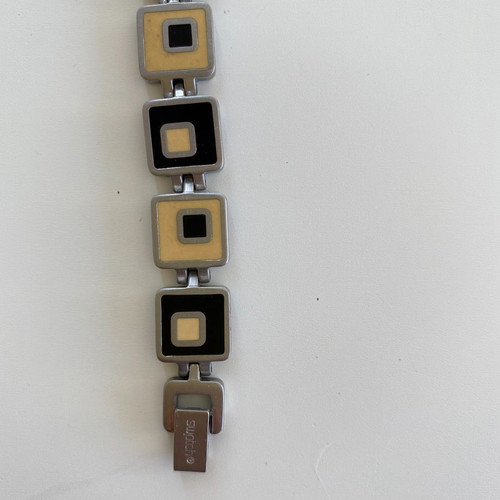 Swatch analog watch used with silver strap-bracelet