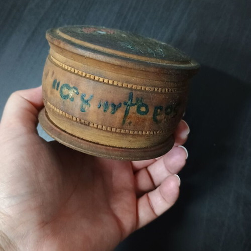 Vintage round wooden box with floral design
