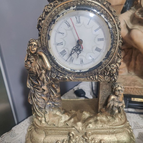 Resin table clock with metallic finish