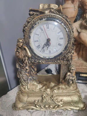 Resin table clock with metallic finish