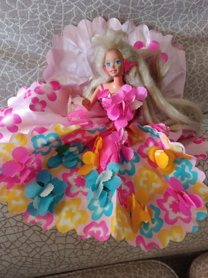 Barbie doll with floral dress like new