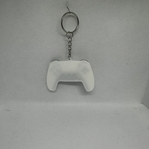 Dualsense PS5 keychain like new, black and white