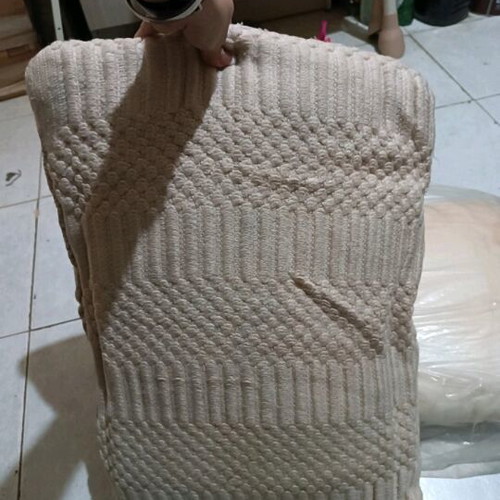 Large handmade beige pillow like new with embossed knitted decoration