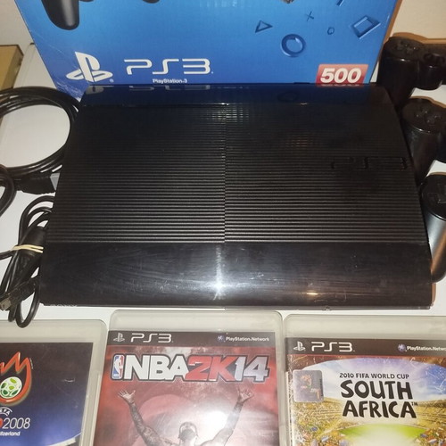 PS3 Super Slim 12GB console with 4 games and 3 controllers