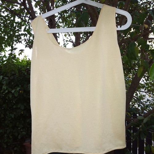 Yellow shiny blouse with white ribbon, loose fit