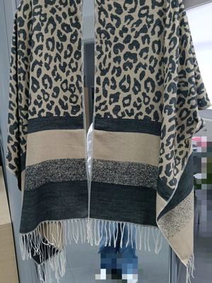 Cape with animal pattern like new, black and beige