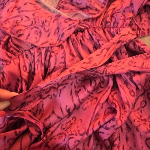 Wrap dress in bright fuchsia with ruffle sleeves