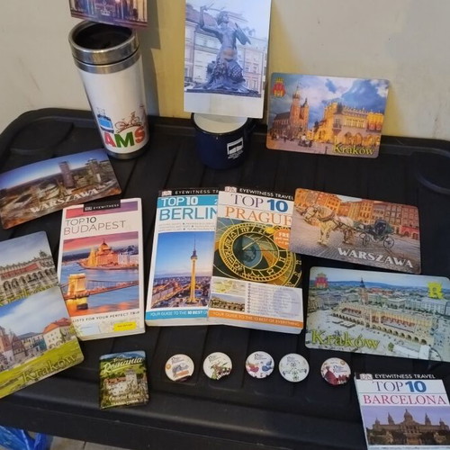 Travel memorabilia collection like new with books, magnets, cup, thermos, postcards, map