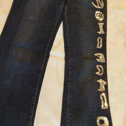 Dark blue jeans with silver bird design, like new, size S