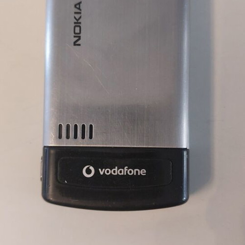 Nokia 6500 Slide phone like new with original charger, silver/black