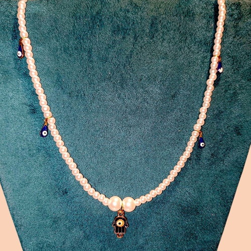 Handmade Hamsa hand necklace with evil eyes and white pearls new