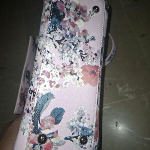 Handbag like new, pink with floral pattern, multiple pockets and strap