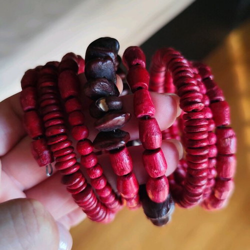 Wooden bracelet set like new with red and brown beads