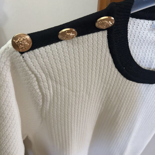 Blouse with gold buttons like new, black and white, one size