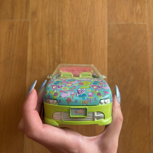 Vintage Polly Pocket set like new with car, dolls, and furniture