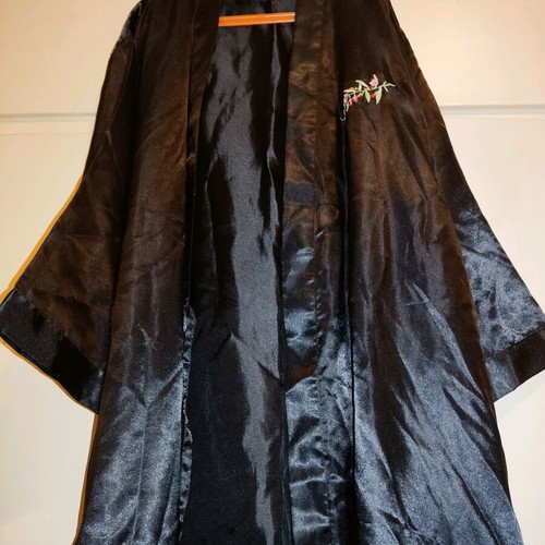 2 women's robes like new, one cream and one black with flower detail
